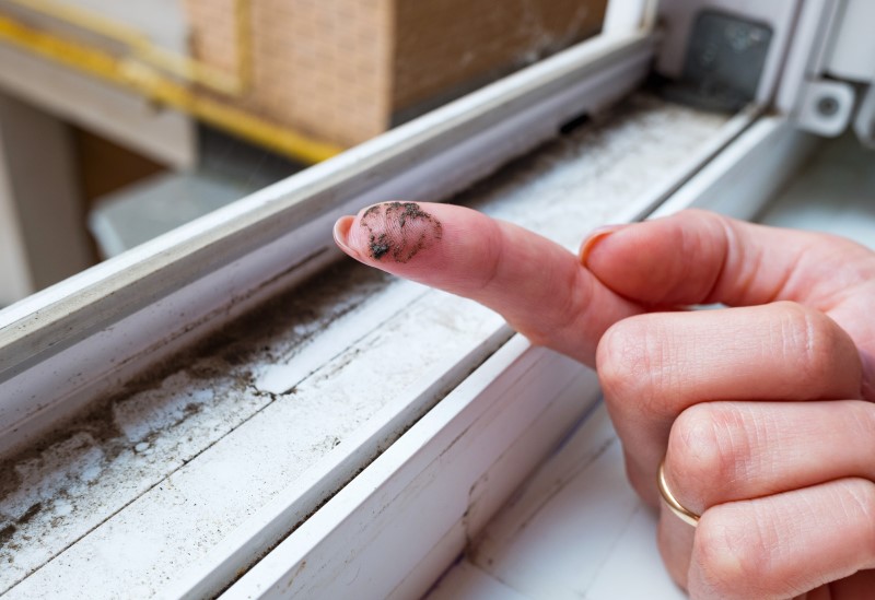 Wiping dirt off a window